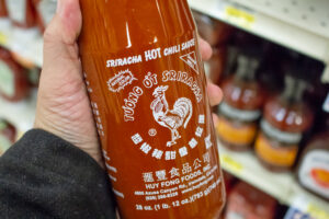 sriracha in hand